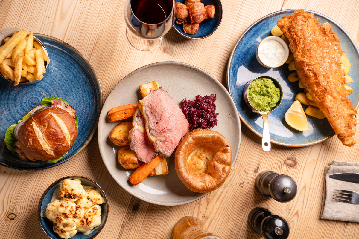 Family enjoy Father's Day roast dinner at the White Hart in South Harting